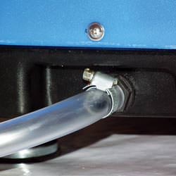 A self-draining crawl space dehumidifier connected to a sump pump system in Newton