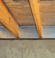 SilverGlo™ insulation installed in a floor joist in Indianola