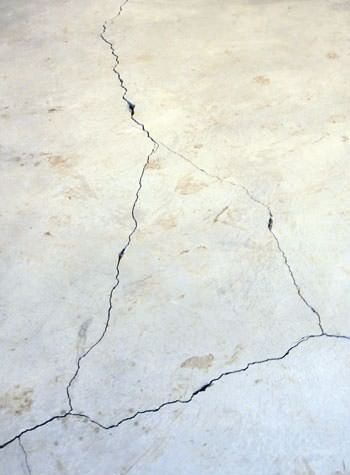 severely cracked, heaving slab floors in a home in Jefferson
