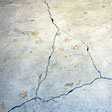 foundation heaving cracks in a slab floor in Urbandale