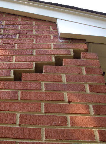 photo of a rotating foundation wall with cracks in Hampton