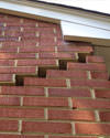 Serious damage to a foundation wall due to settlement of a home in Creston