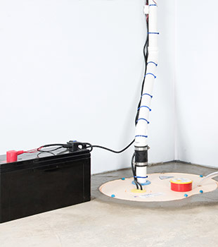 A sump pump installed in Indianola by Midwest Basement Systems