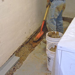 Digging a trench for a French Drain system in Des Moines