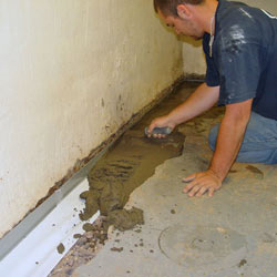 Testing a French drain system in a Ottumwa home.