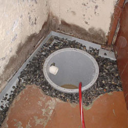 Installing a sump in a sump pump liner in a Waterloo home