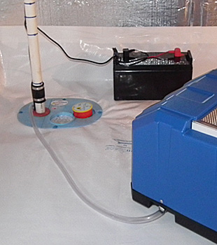 Closeup of a crawl space sump pump installed in Fort Dodge