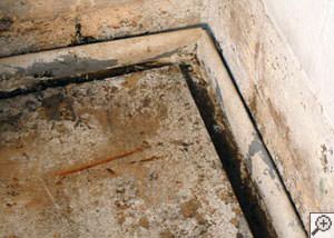 A weeping tile system that incorporates an open gap along the floor that will accept dirt, dust, and debris as well as flooding groundwater. This installation was completed by a contractor in Centerville.